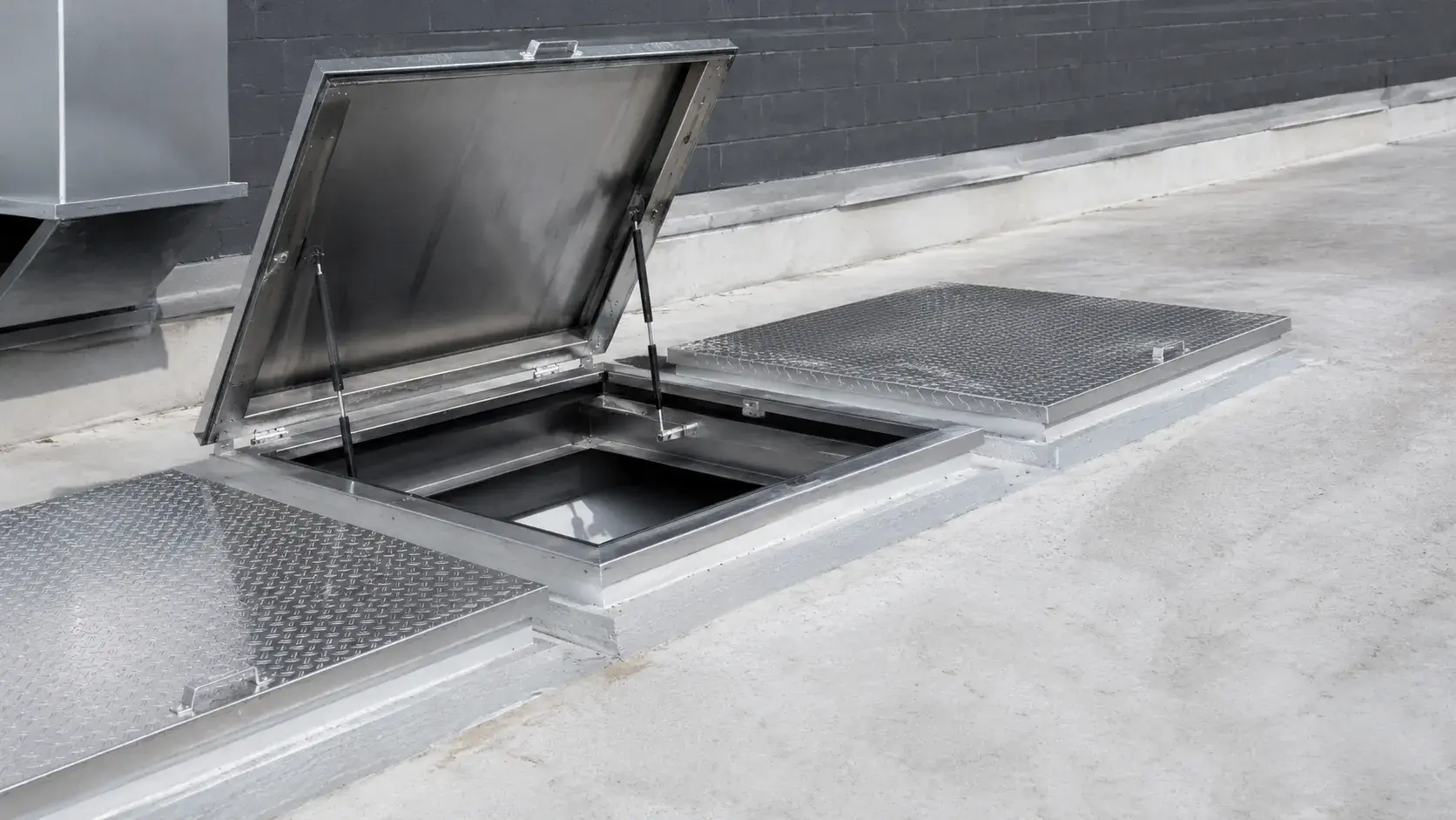 Access Hatch Covers in Scarborough, Ontario, fabricated and installed by The Grate Guys