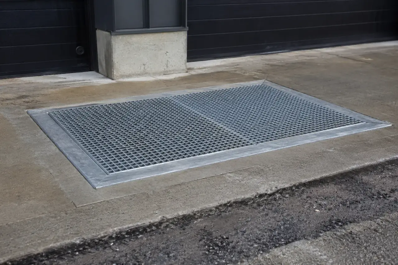 Completed Custom Drain Covers installation by The Grate Guys