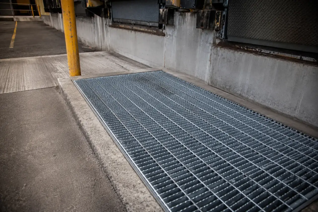 Completed Custom Metal Grates installation by The Grate Guys