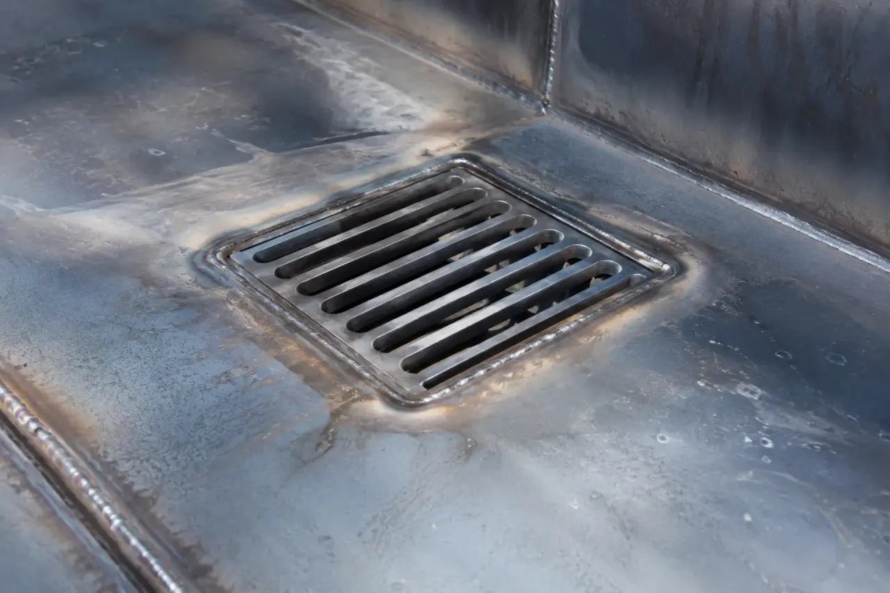 Drainage Repair in Waterloo being fabricated and installed by The Grate Guys