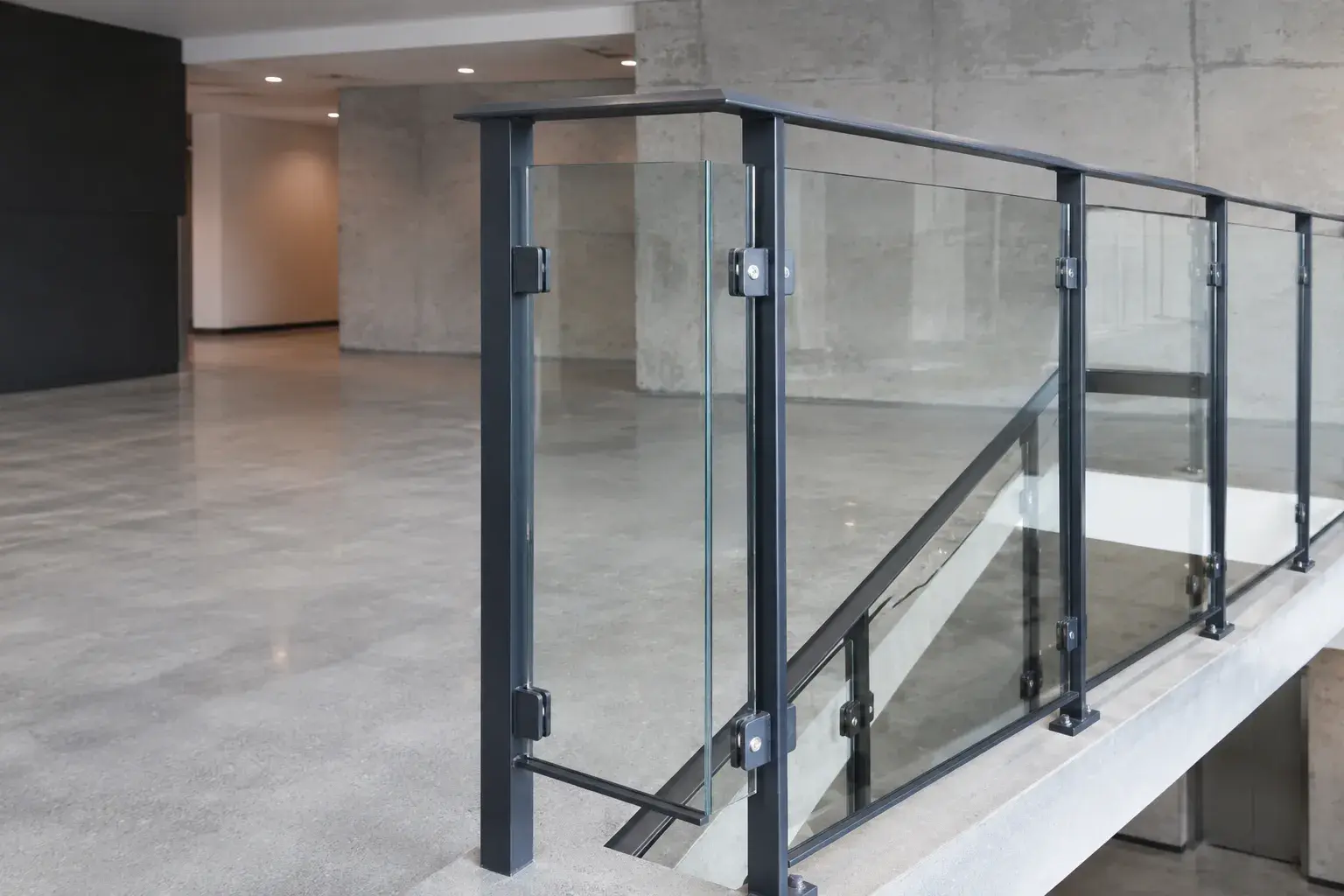 Glass Railing in Fort Erie, Ontario, fabricated and installed by The Grate Guys