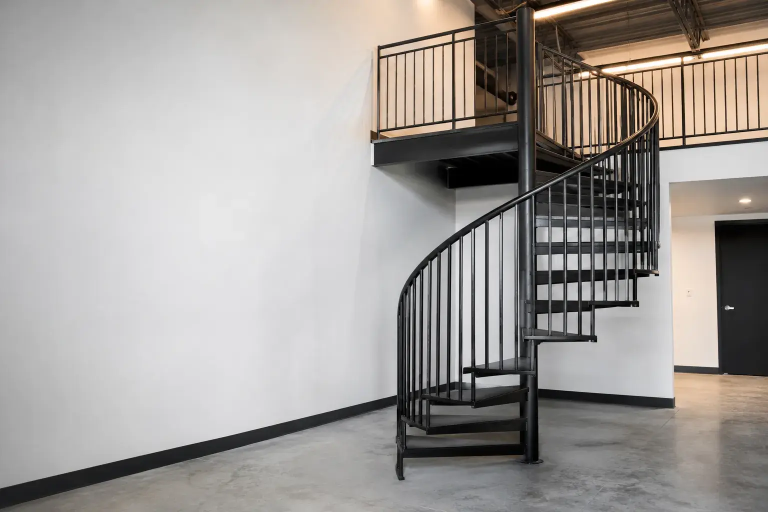 Spiral Staircases in Richmond Hill, Ontario, fabricated and installed by The Grate Guys