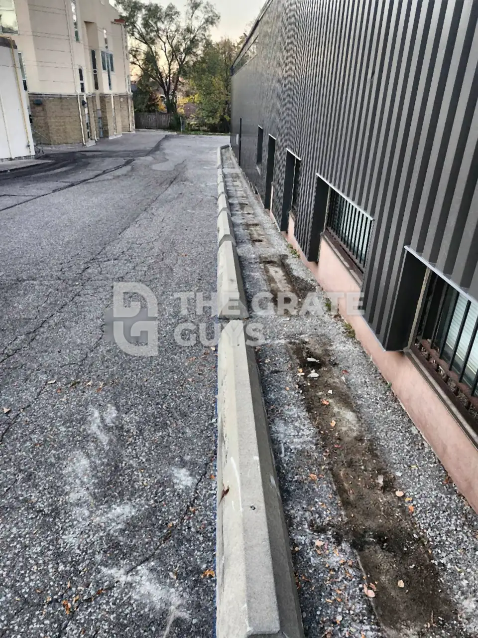 Concrete Parking Curbs installed at a property in North York, Toronto, The Grate Guys